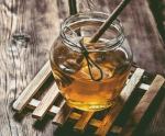 glass-jar-with-natural-honey-and-a-spoon.jpg