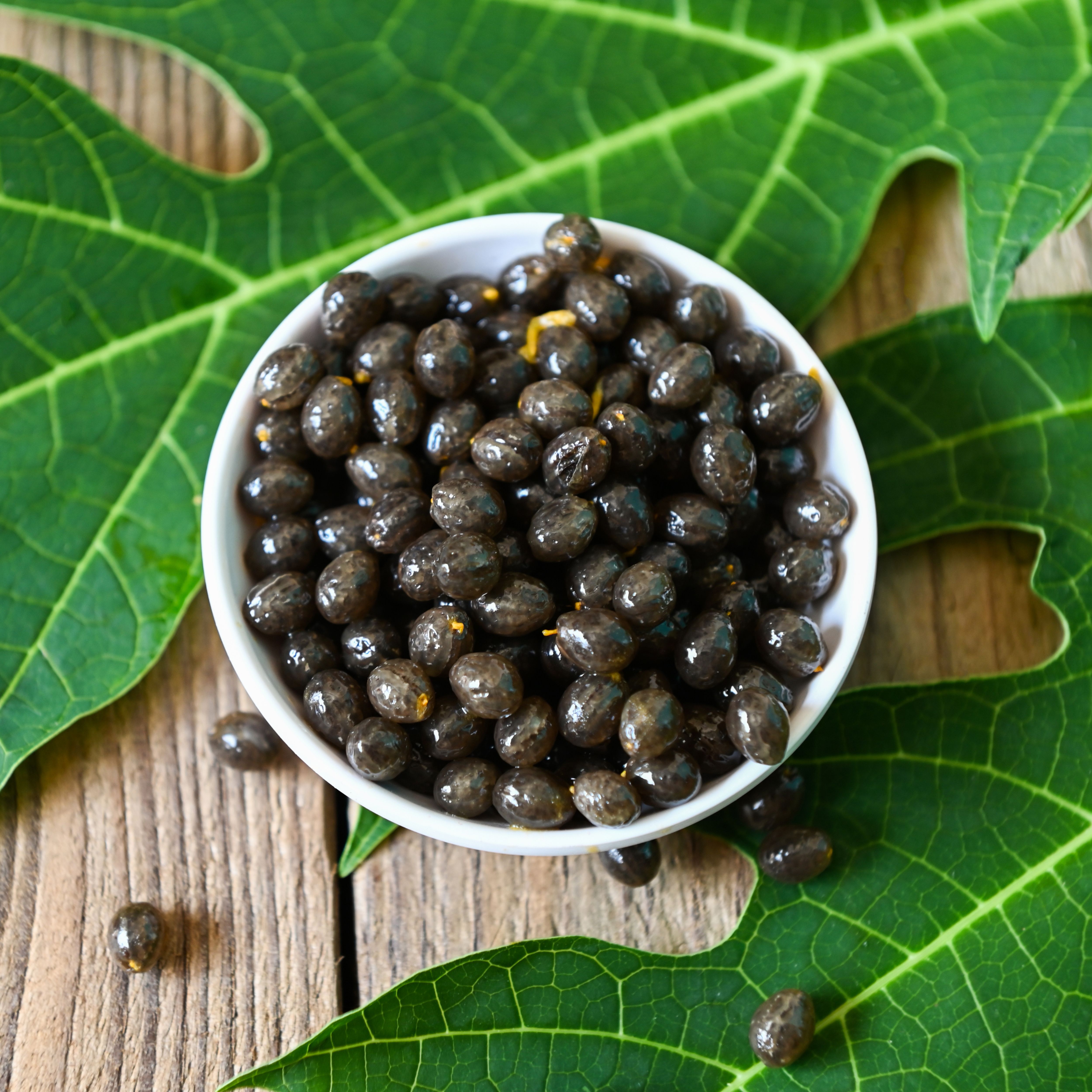 papaya seeds in a bowl