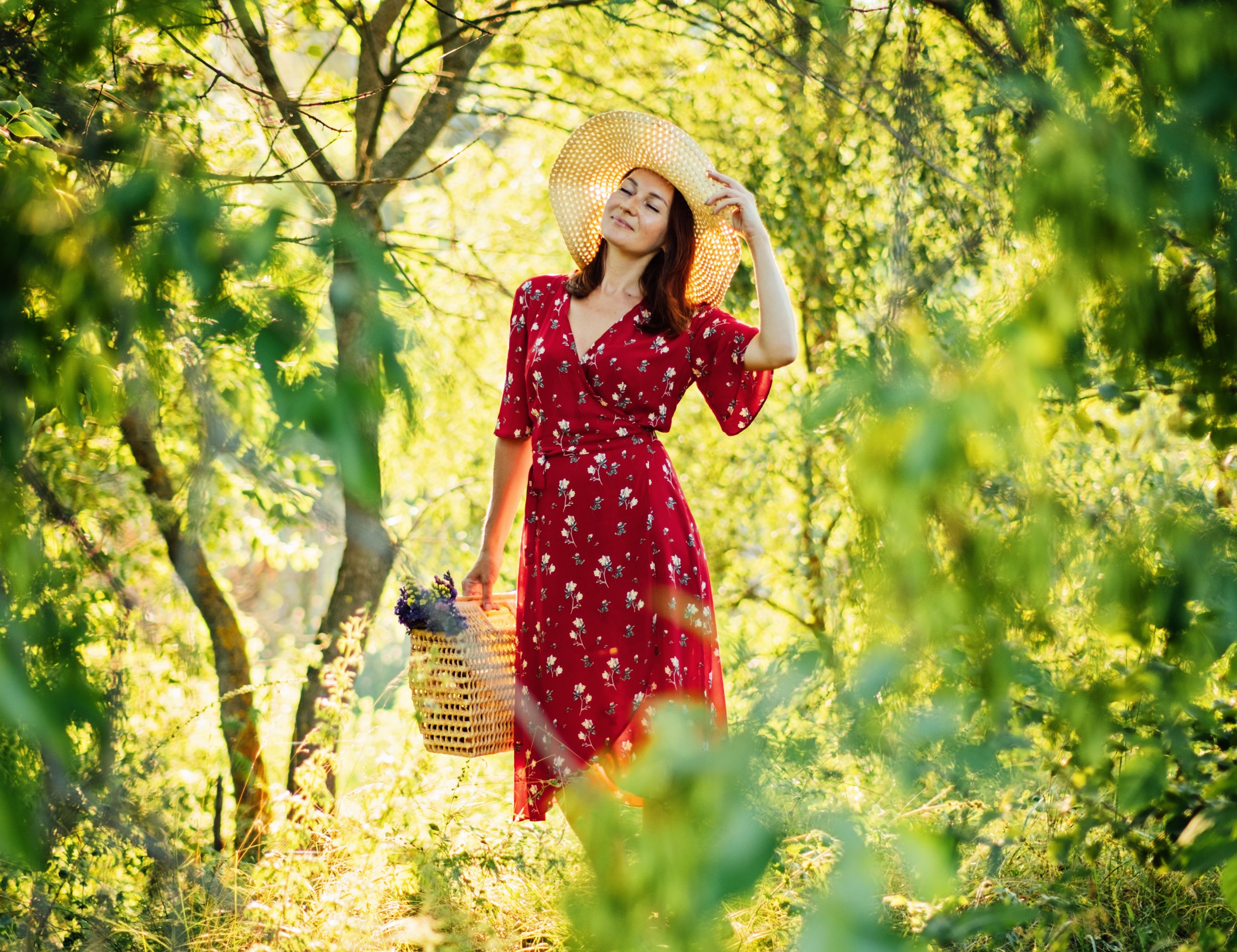 a woman walking in the woods