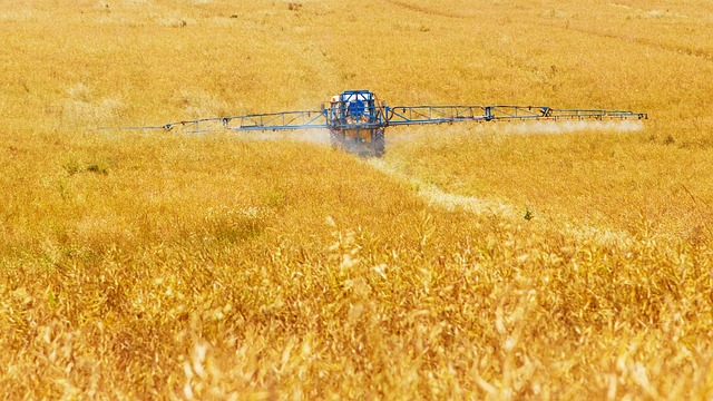 tractor spraying chemicals